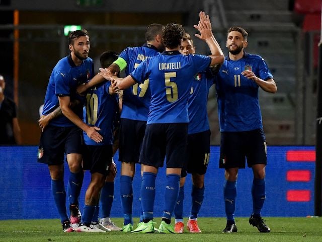 Italy's Domenico Berardi celebrates scoring their fourth goal with teammates on June 4, 2021
