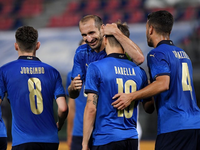 Italy's Nicolo Barella celebrates scoring their second goal with Giorgio Chiellini on June 4, 2021
