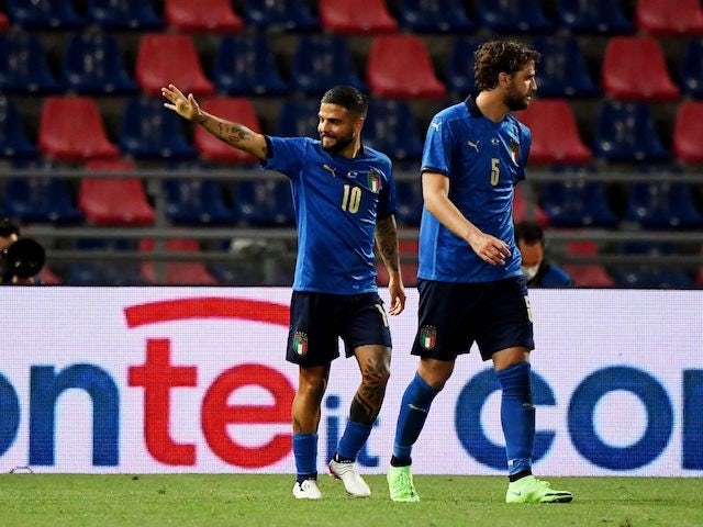 Italy's Lorenzo Insigne celebrates scoring their third goal on June 4, 2021