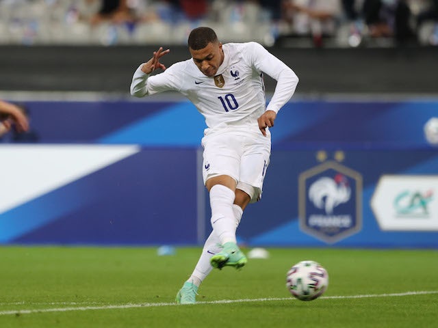 Kylian Mbappe shoots on goal for France on June 8, 2021