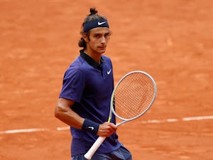 French Open roundup: Djokovic survives scare, Nadal eases to victory