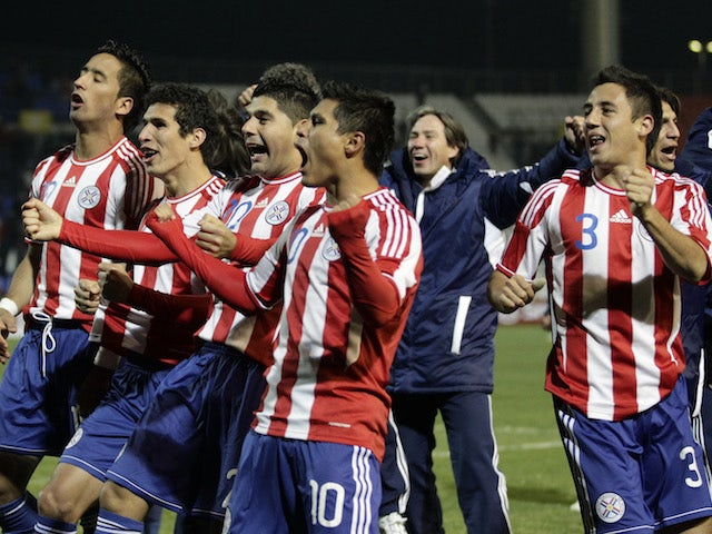 Paraguay players celebrate qualifying for the 2011 Copa America final