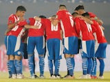 Paraguay team huddle before the match on June 9, 2021