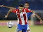 Paraguay's Angel Romero in action with Brazil's Eder Militao on June 9, 2021