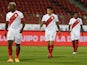 Peru's Gianluca Lapadula and teammates look dejected after the match on November 14, 2020