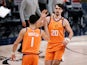 Phoenix Suns forward Dario Saric reacts with guard Devin Booker against the Denver Nuggets on June 12, 2021