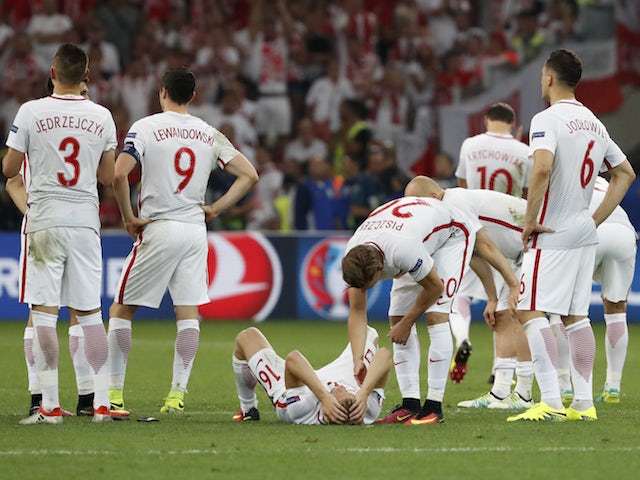 Poland players react to being knocked out in the quarter-finals of Euro 2016