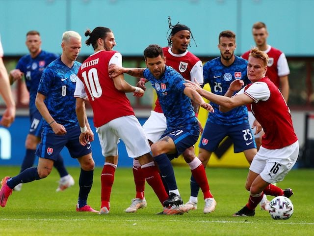 Slovakia's Michal Duris in action with Austria's Philipp Lienhart on June 6, 2021