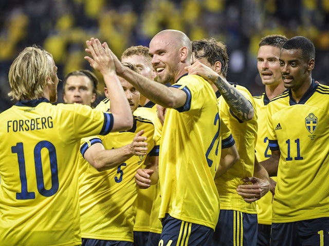 Sweden's Marcus Danielson celebrates scoring their second goal with teammates on June 5, 2021