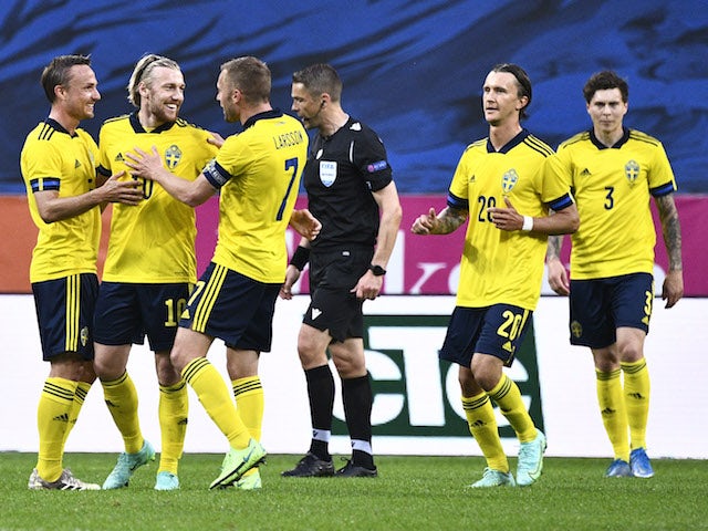 Sweden's Emil Forsberg celebrates scoring their first goal with teammates on June 5, 2021