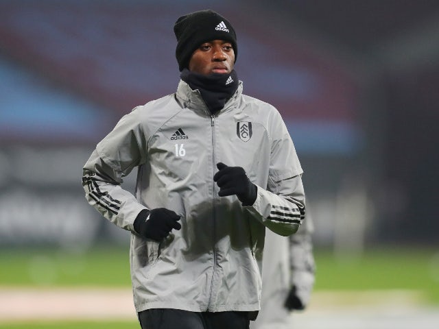 Tosin Adarabioyo warms up for Fulham in November 2020