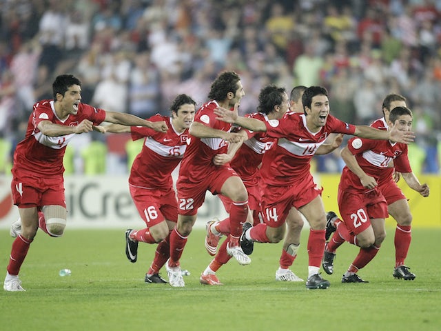 Turkey's players celebrate after their Euro 2008 quarter-final soccer match penalty shoot-out victory over Croatia at the Ernst Happel Stadium in Vienna, June 20, 2008