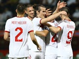 Turkey's Kaan Ayhan celebrates scoring their second goal with teammates on May 27, 2021
