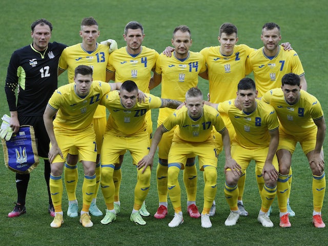 Ukraine players pose before their match on June 7, 2021