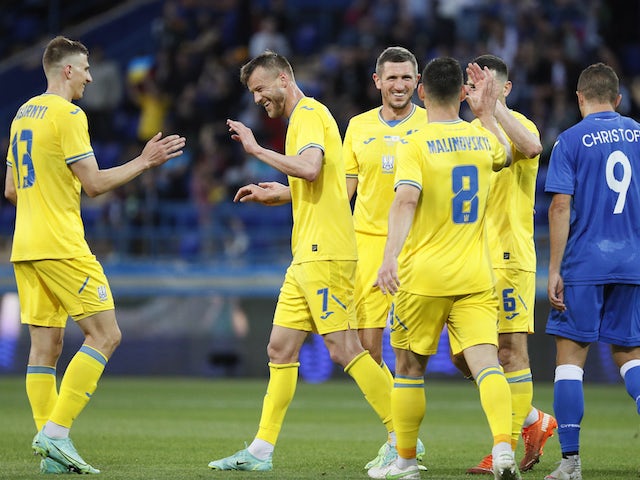 Ukraine's Andriy Yarmolenko celebrates scoring their fourth goal with teammates on June 7, 2021