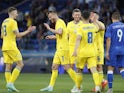 Ukraine's Andriy Yarmolenko celebrates scoring their fourth goal with teammates on June 7, 2021