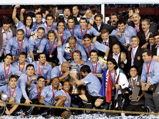 Uruguay players celebrate winning the 2011 Copa America final