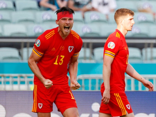 Kieffer Moore celebrates scoring for Wales against Switzerland at Euro 2020 on June 12, 2021