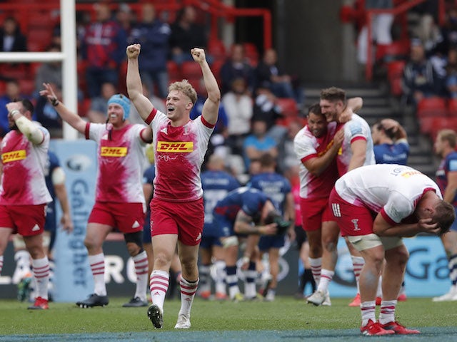 Harlequins' Louis Lynagh celebrates with teammates after the match with Bristol Bears on June 19, 2021