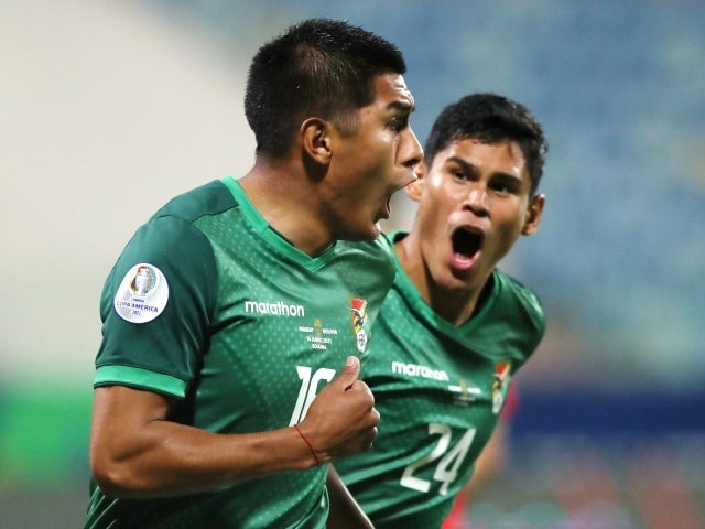 Bolivia's Erwin Saavedra celebrates scoring their first goal with Jaume on June 15, 2021