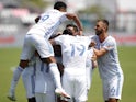 FC Cincinnati players celebrate around defender Gustavo Vallecilla after scoring on May 22, 2021