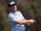 Louis Oosthuizen holds share of lead as US Open resumes