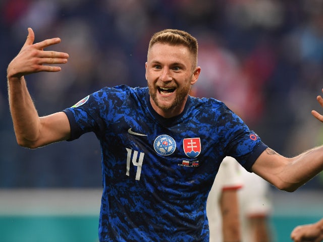 Milan Skriniar celebrates scoring for Slovakia against Poland at Euro 2020 on June 14, 2021