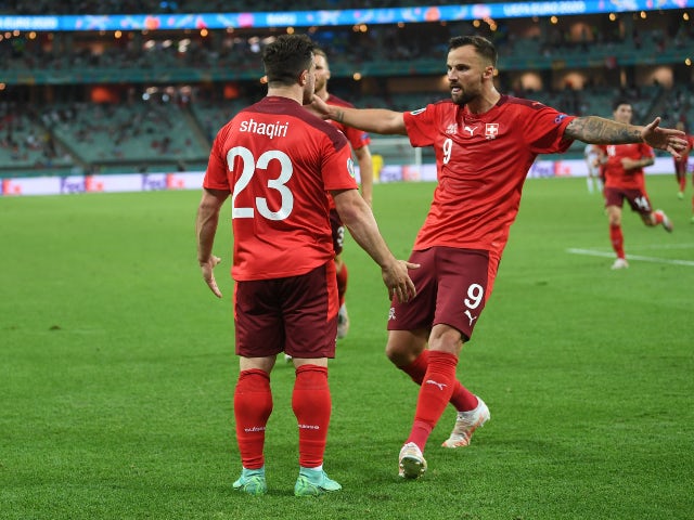 Switzerland's Xherdan Shaqiri celebrates scoring their third goal against Turkey at Euro 2020 on June 20, 2021