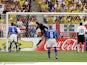 Ronaldinho scores for Brazil over England's David Seaman at the 2002 World Cup on June 21, 2002