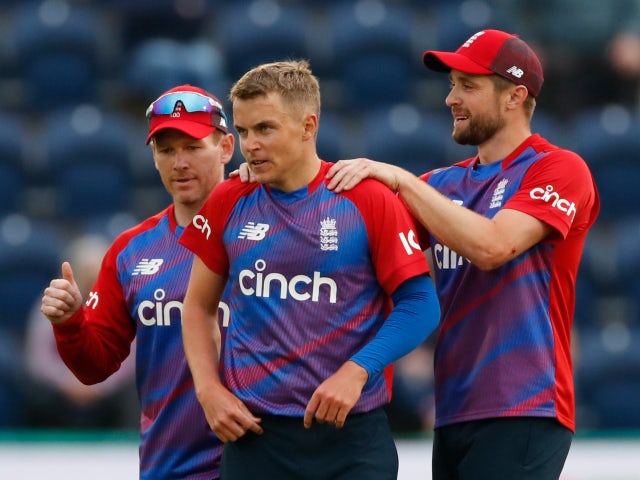 England's Sam Curran celebrates with teammates after taking the wicket of Sri Lanka's Dasun Shanaka on June 23, 2021