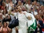 Andy Murray waves to the crowd after being knocked out of Wimbledon on July 2, 2021