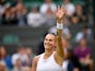 Belarus' Aryna Sabalenka celebrates winning her first round match against Romania's Monica Niculescu at Wimbledon on June 28, 2021