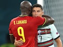 Belgium's Romelu Lukaku consoles Portugal's Cristiano Ronaldo on June 27, 2021