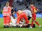 Italy's Leonardo Spinazzola goes down injured against Belgium at Euro 2020 on July 2, 2021