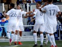 Los Angeles Galaxy forward Javier Hernandez celebrates with teammates after scoring a goal on June 27, 2021
