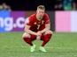 Belgium's Kevin De Bruyne squats on June 27, 2021