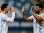 Argentina's Lionel Messi celebrates scoring their second goal with teammate Sergio Aguero on June 29, 2021