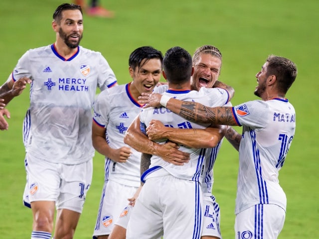 FC Cincinnati midfielder Luciano Acosta celebrates with teammates scoring a goal on June 27, 2021