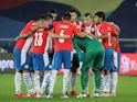 Paraguay team huddle before the match on June 29, 2021