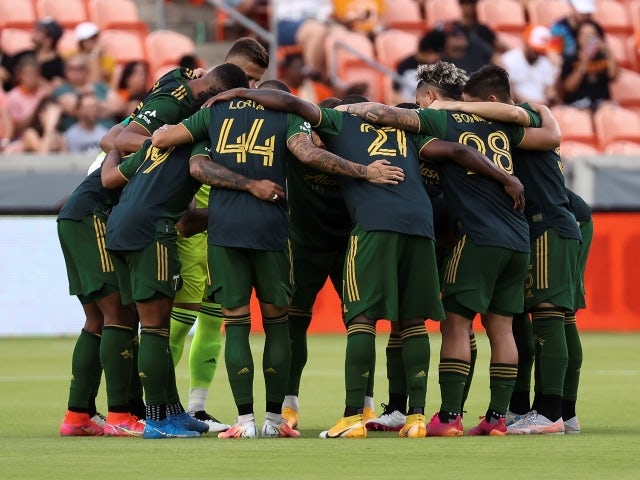 Portland Timbers starting players huddle before the start of the match on June 24, 2021