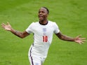 England's Raheem Sterling celebrates scoring their first goal on June 29, 2021