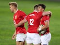 The Lions celebrate Louis-Rees Zammit's try against the Sigma Lions on July 3, 2021