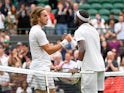 Frances Tiafoe of the U.S. shakes hands with Greece's Stefanos Tsitsipas at Wimbledon on June 28, 2021