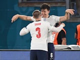 England duo Harry Maguire and Luke Shaw celebrate against Ukraine at Euro 2020 on July 3, 2021