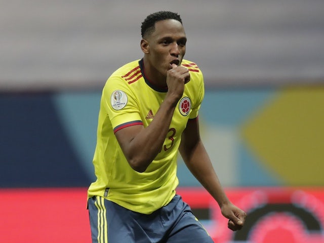 Colombia's Yerry Mina celebrates after scoring a penalty during a penalty shootout on July 3, 2021