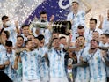 Argentina's Lionel Messi and teammates celebrate winning the Copa America on July 10, 2021