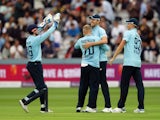 England's Craig Overton celebrates taking a catch to dismiss Pakistan's Saud Shakeel on July 10, 2021
