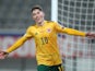 Harry Wilson celebrates scoring for Wales in March 2021