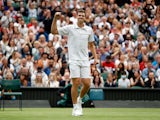 Hubert Hurkacz celebrates at Wimbledon on July 6, 2021