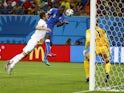 Italy's Mario Balotelli scores against England at the 2014 World Cup on 15 June, 2014